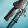ass-saver-regular-black-mounted-on-saddle-mudguard_900x.webp